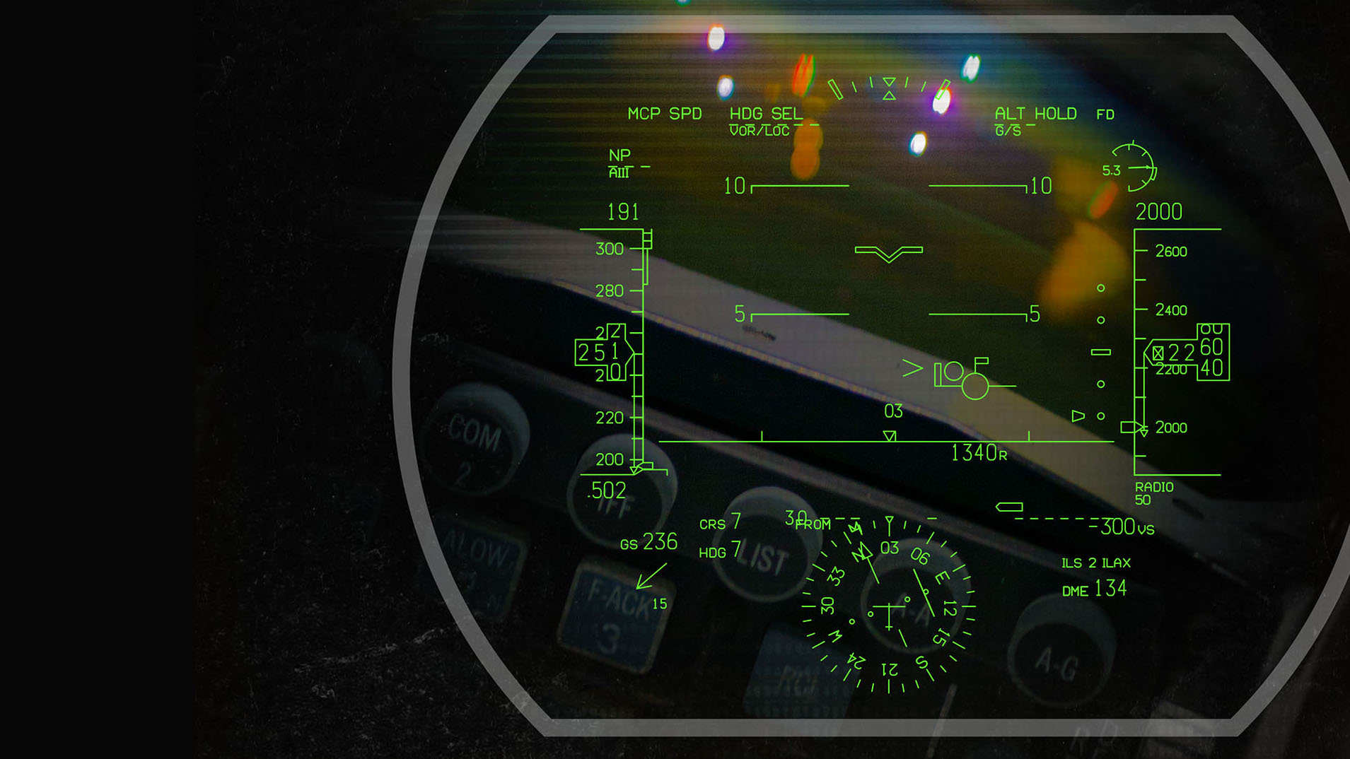 Head-up display symbology overlaid on an image of a Digital Light Engine head-up display system.