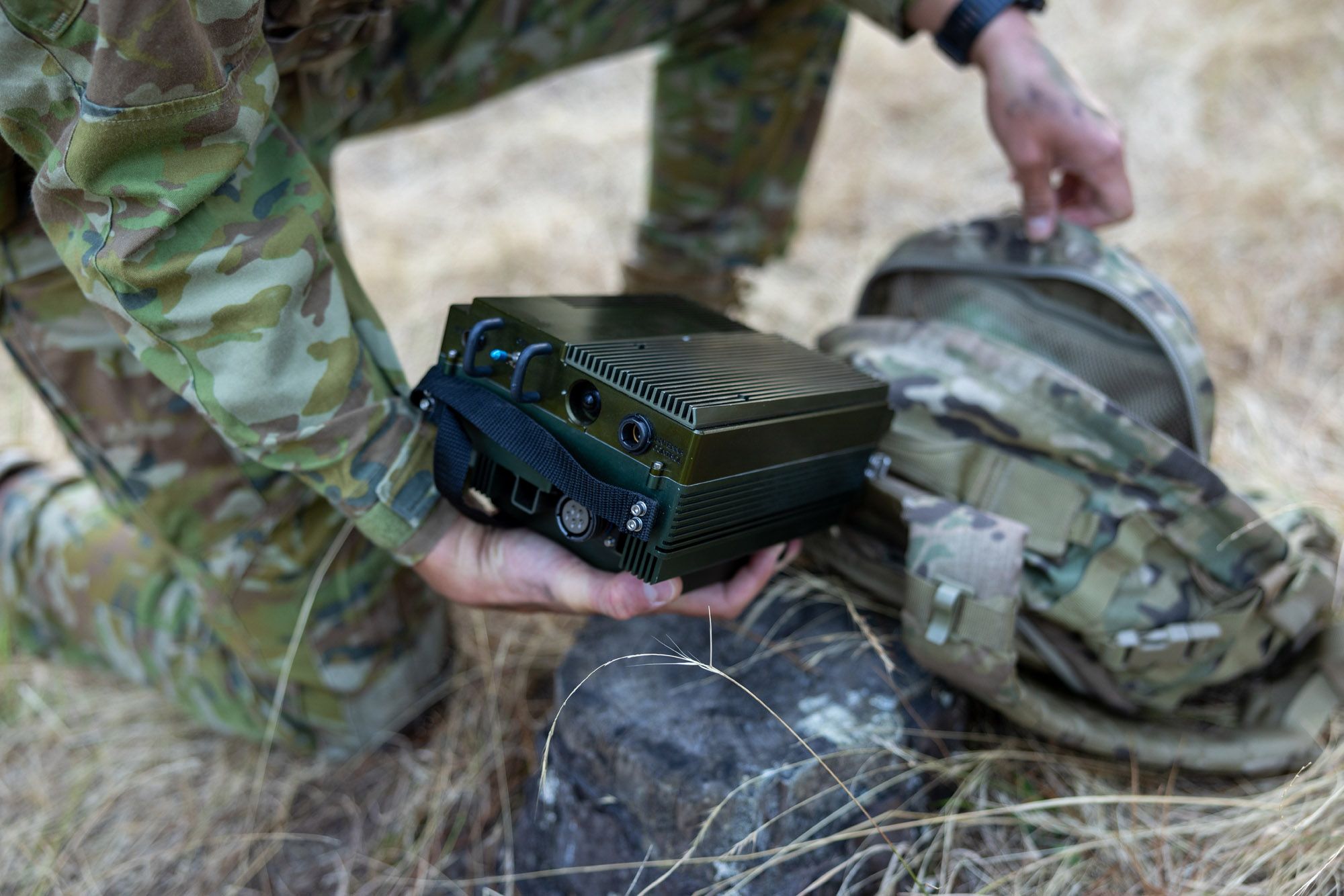Mantlet Edge being packed away into a backpack by a soldier