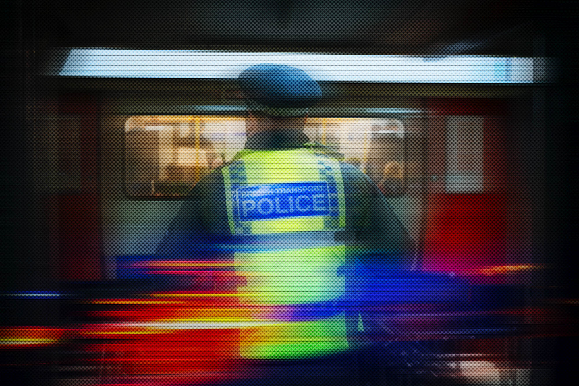 Abstract image of Police standing in front of London underground tube 