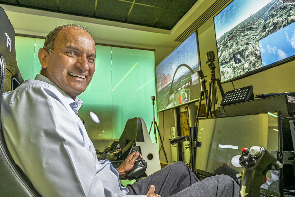 Alvin sat in a cockpit simulator