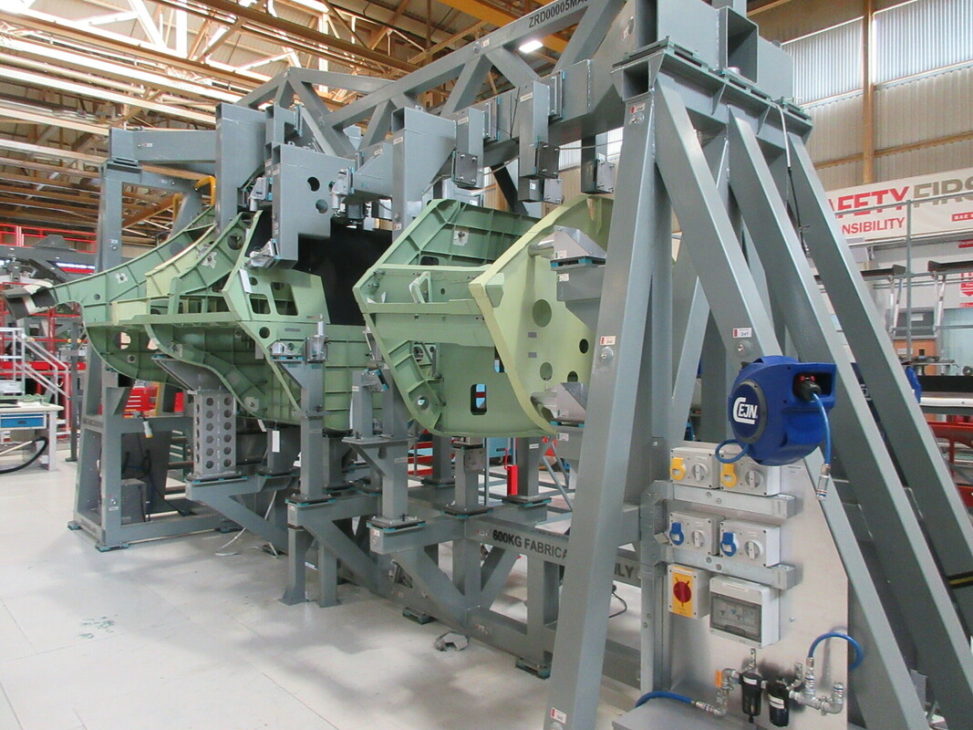 The demonstrator aircraft being manufactured in a rig