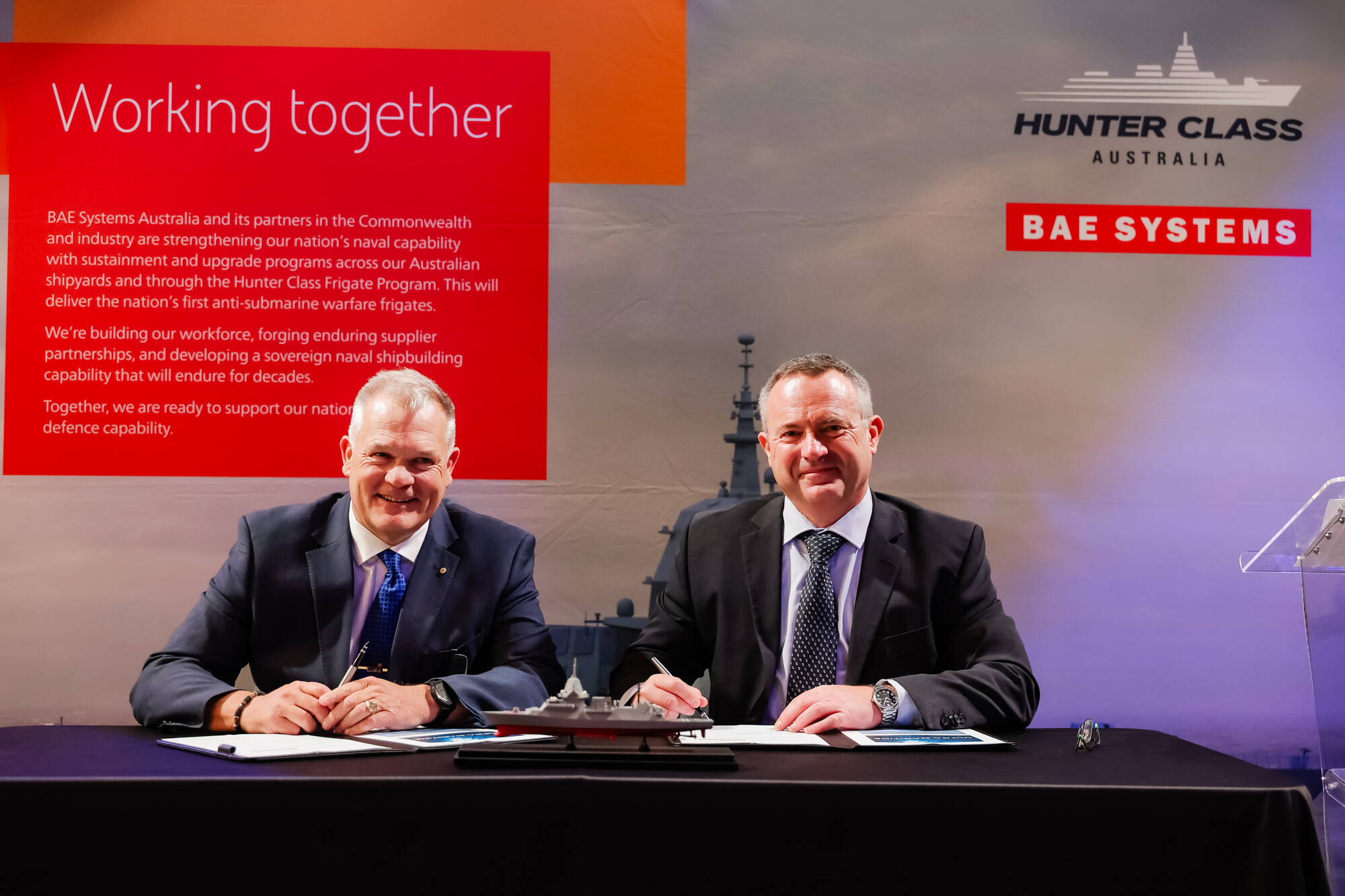 Contract signing photo of Jonathan Sadleir, General Manager, Ultra Maritime Australia and Andy Coxall, Delivery Director – Acquisition, BAE Systems Maritime Australia
