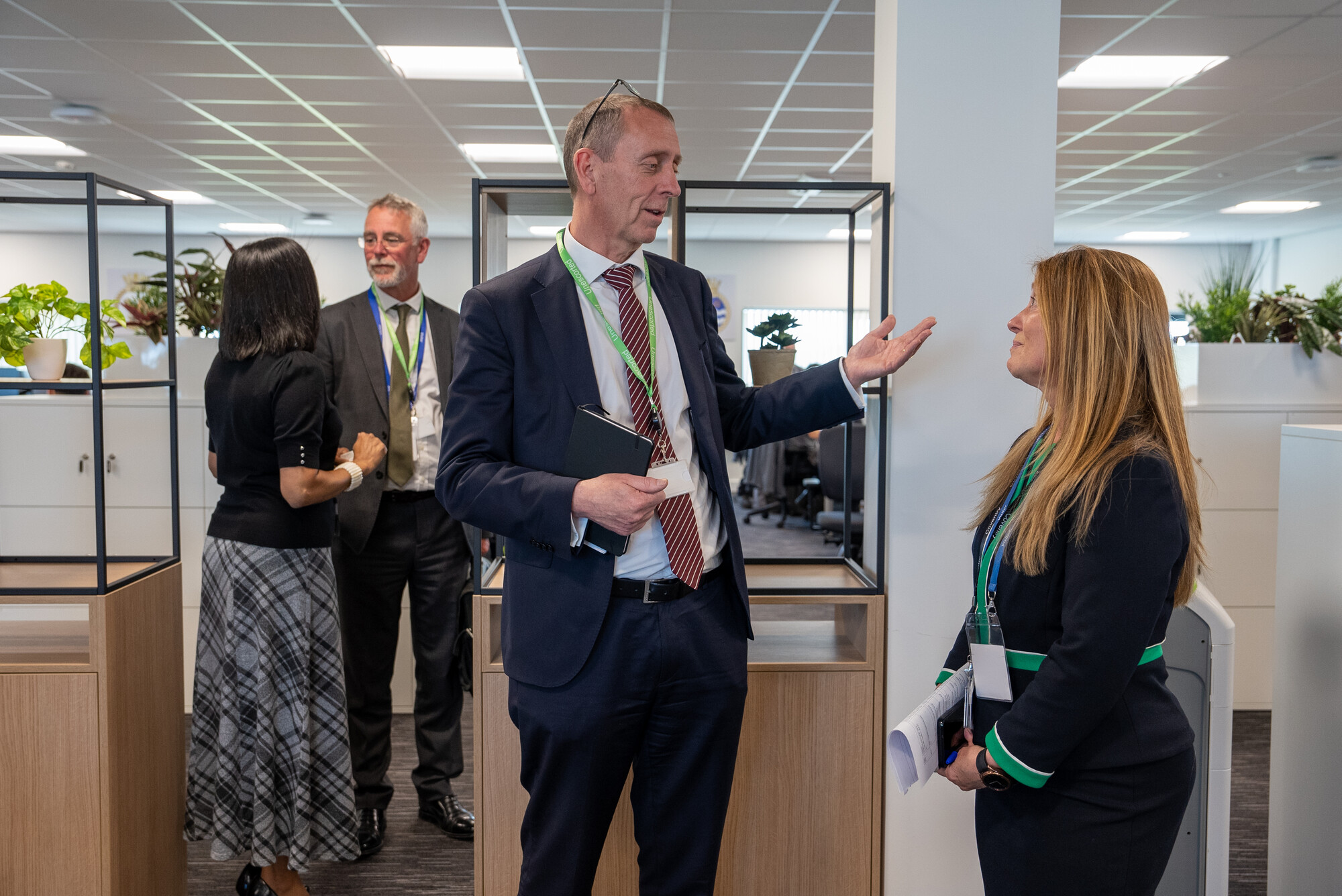Image of Steve Timms talking to employees