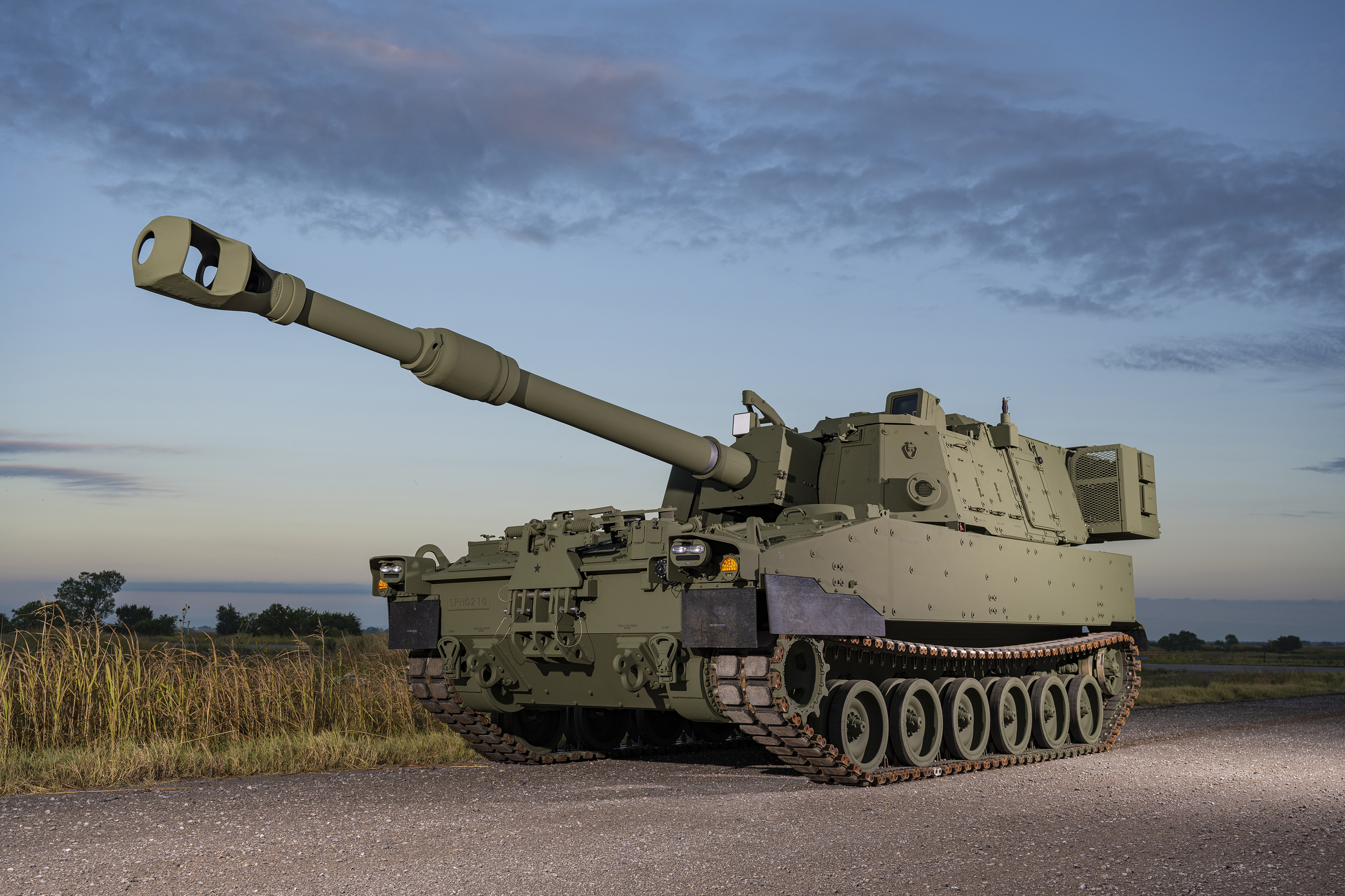 A green M109A7 at twilight
