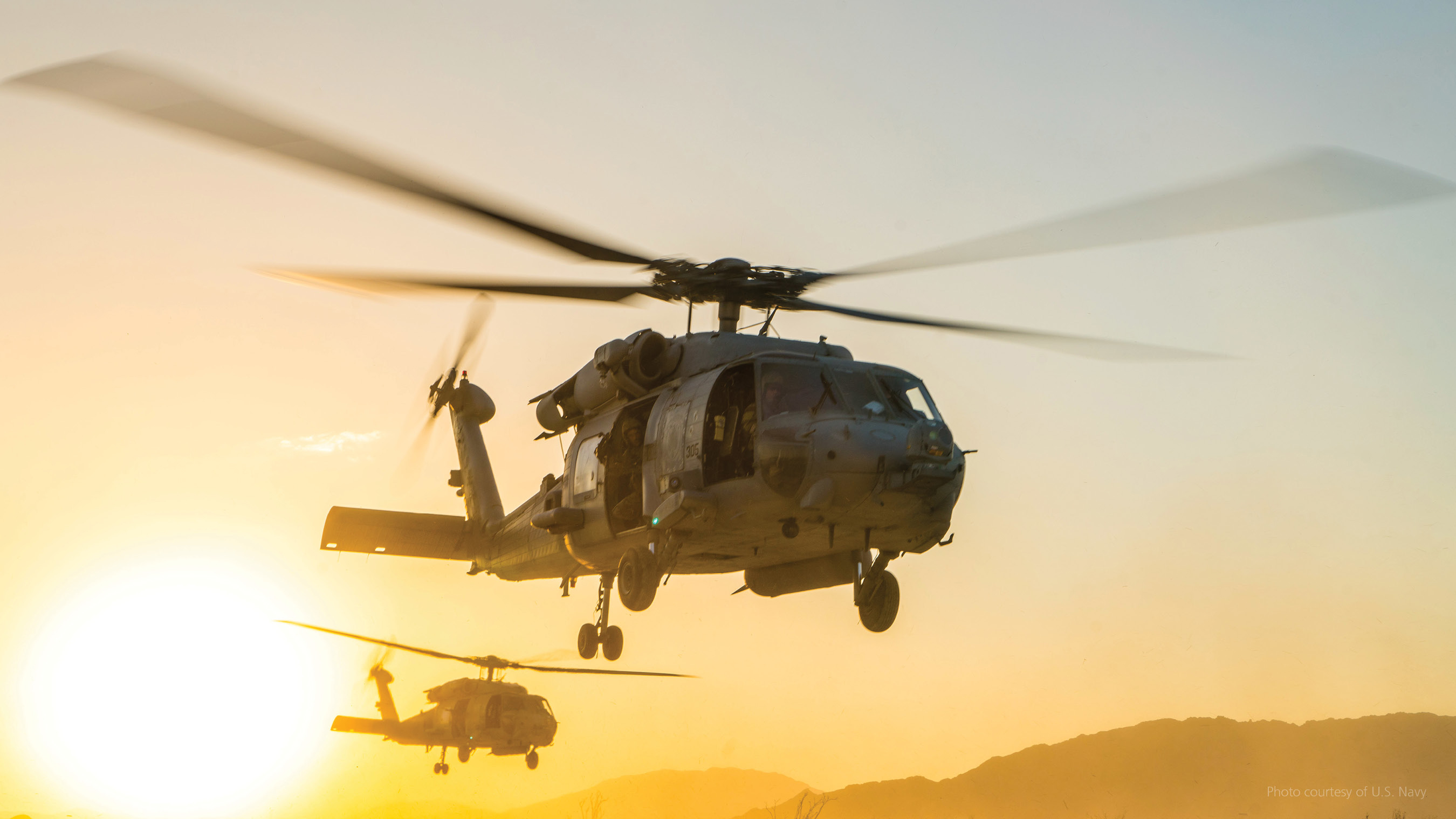 U.S. Navy helicopters on a mission, using BAE Systems’ multi-band, multi-mission, anti-jam Airborne Tactical Radio systems for secure communications. 