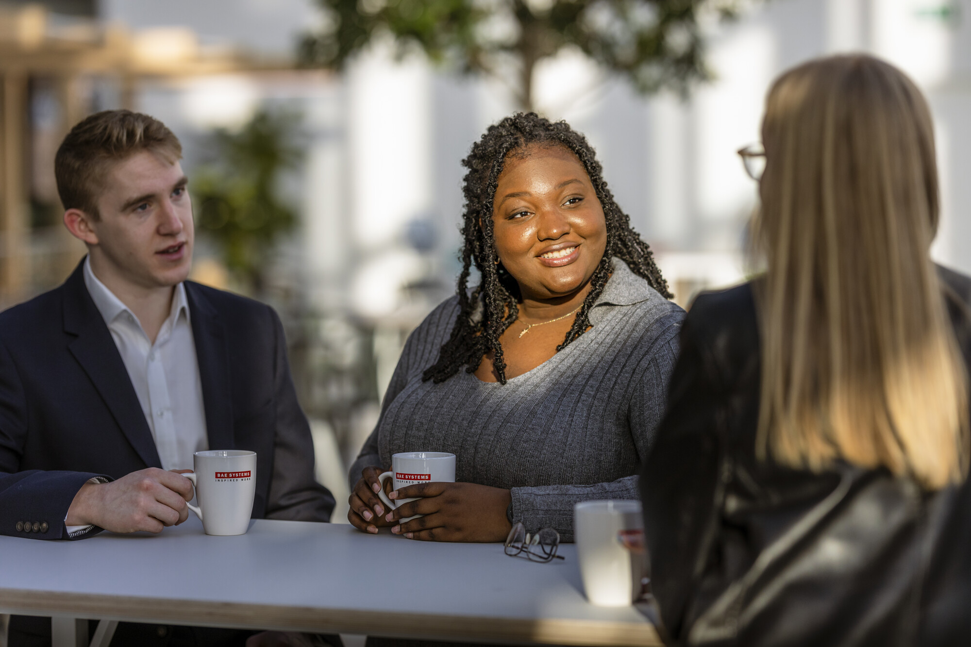 BAE Systems employees having a discussion