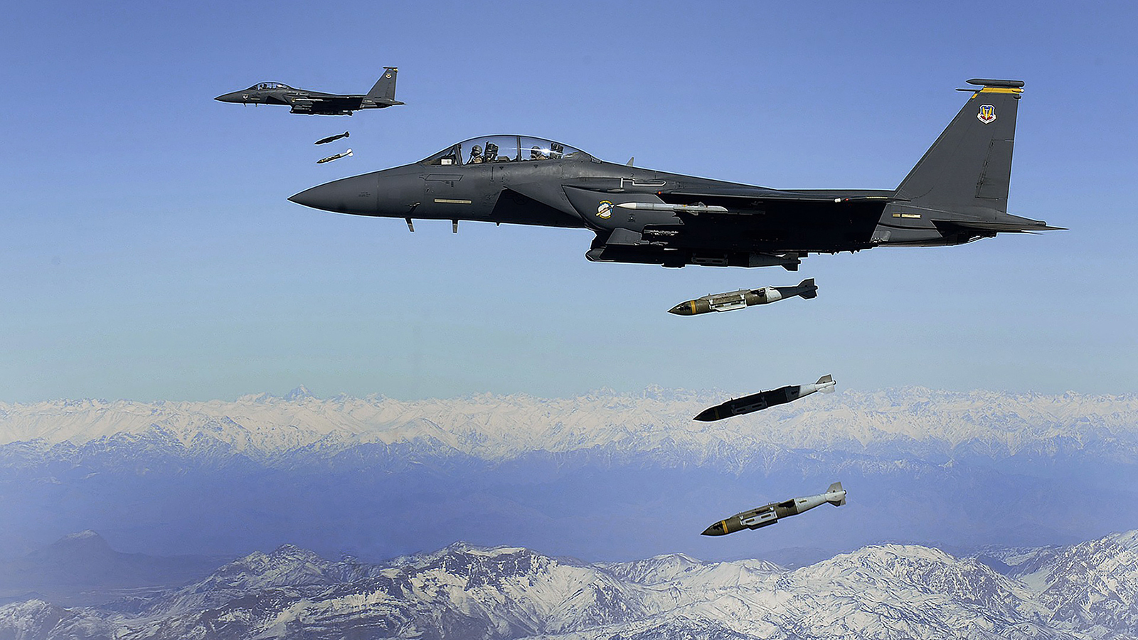 F-15E Strike Eagle on a mission launching ordnance accurately and safely thanks in part to the Integrated GPS Anti-Jam (IGAS) technology of BAE Systems.